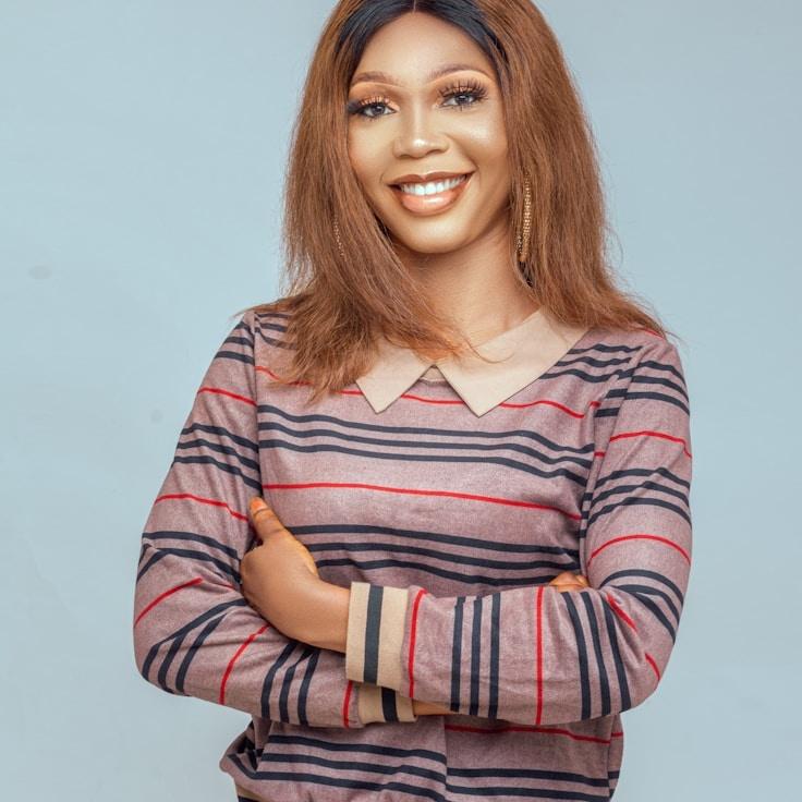 Morgan Reed, Client Relations Director, discussing corporate gifting strategy with business clients